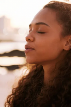 woman exhales